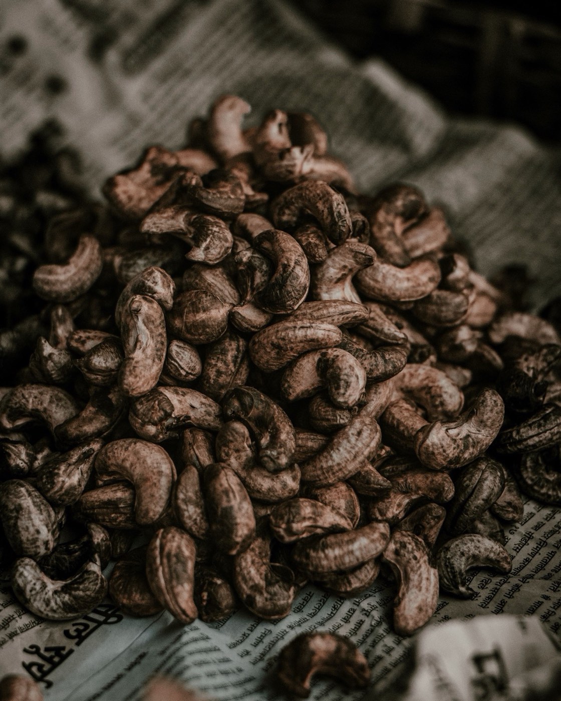 Raw cashew nuts in shell, close up